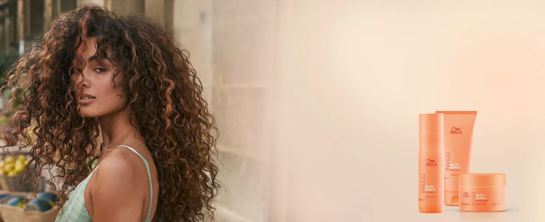 Curly hair model + Invigo Nutri-Enrich products