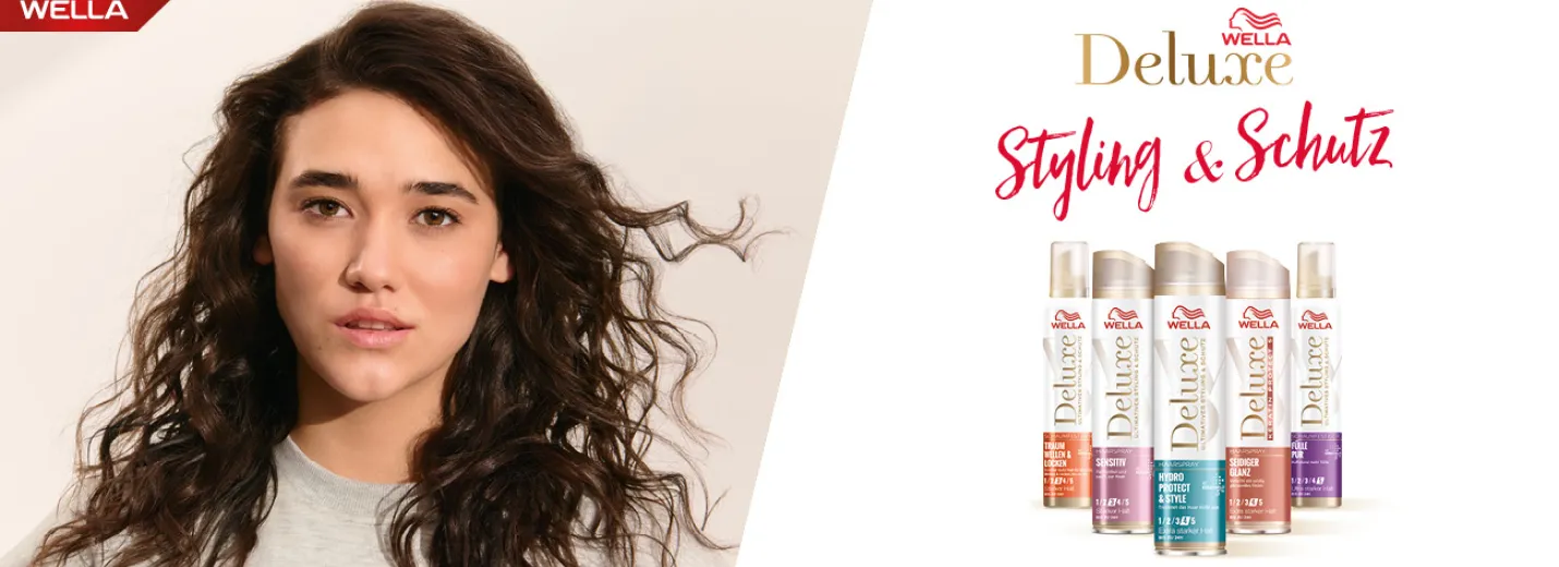 Frau mit blondem Haar. Wella Deluxe Produkte und Text: Styling & Schutz – mit 5-fach Keratin-Schutzkomplex