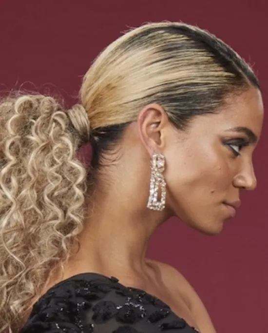 skills x you, woman with blonde curly hair